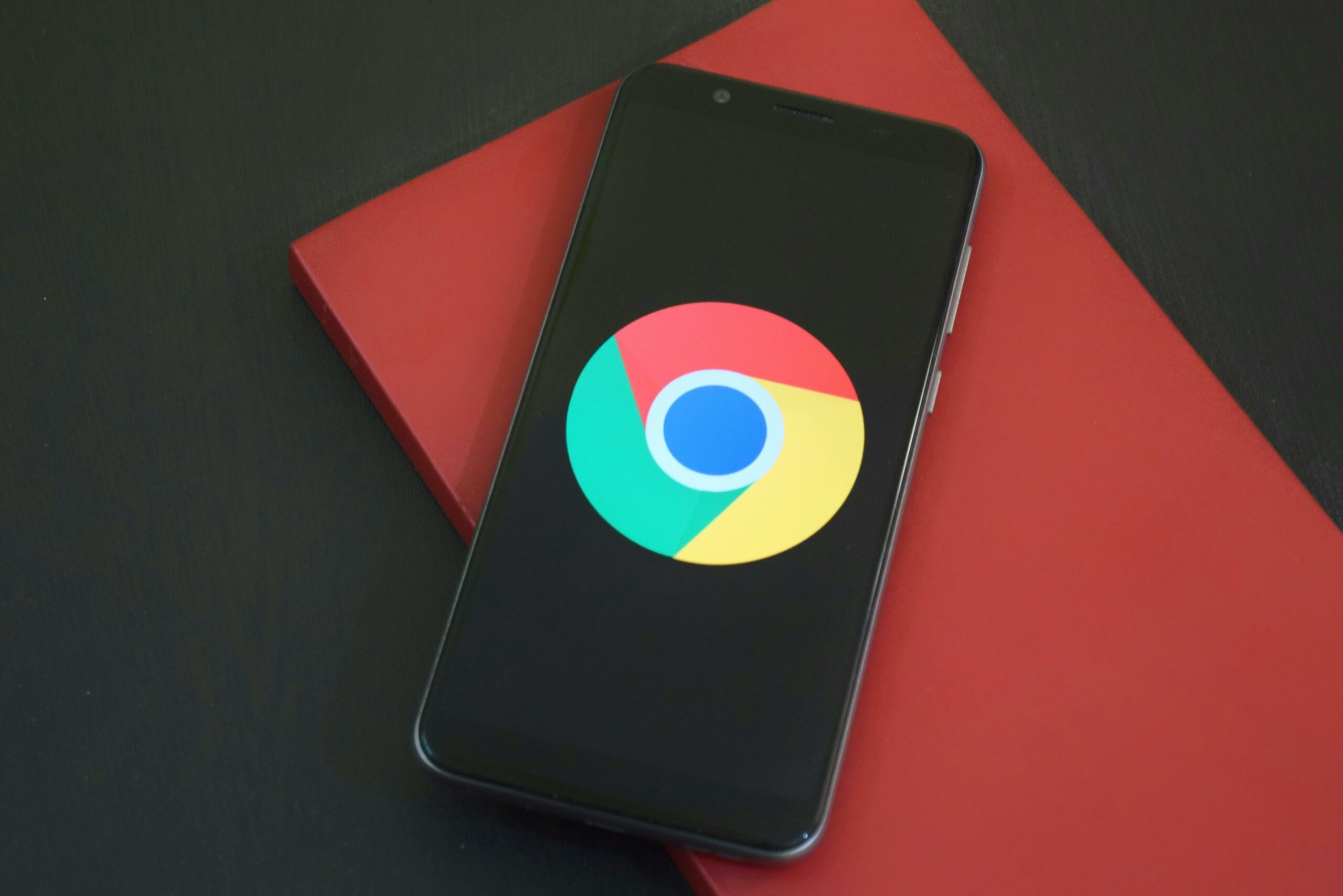 closeup of an iphone with Google Chrome icon