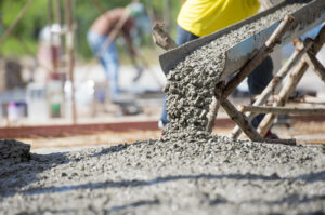 concrete pouring out of a machine